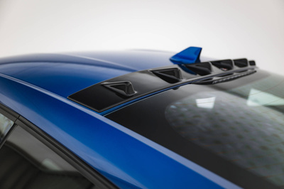 The extension of the rear window Ford Mustang GT Mk7